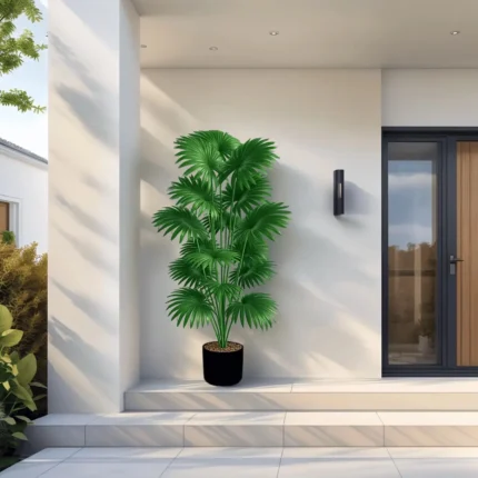 Tall artificial palm tree with lush green tropical fronds standing in a decorative pot.