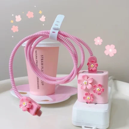 Charger data cable protector set with decorative bow adapters and spiral cord wrap.