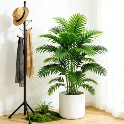 Artificial palm tree with lush green faux leaves in decorative white pot.