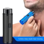 Mini electric shaver with high speed magnetic motor and rotary shaving head.